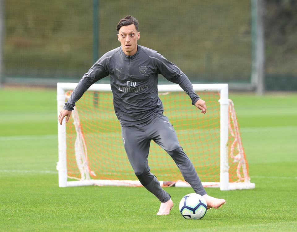 Emery claims Ozil's absence was down to illness, not a bust-up