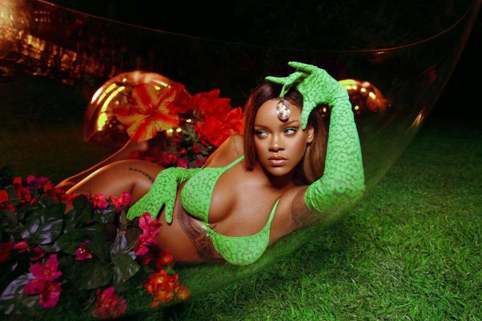  Rihanna modelled a green bra and gloves from the Savage X Fenty range