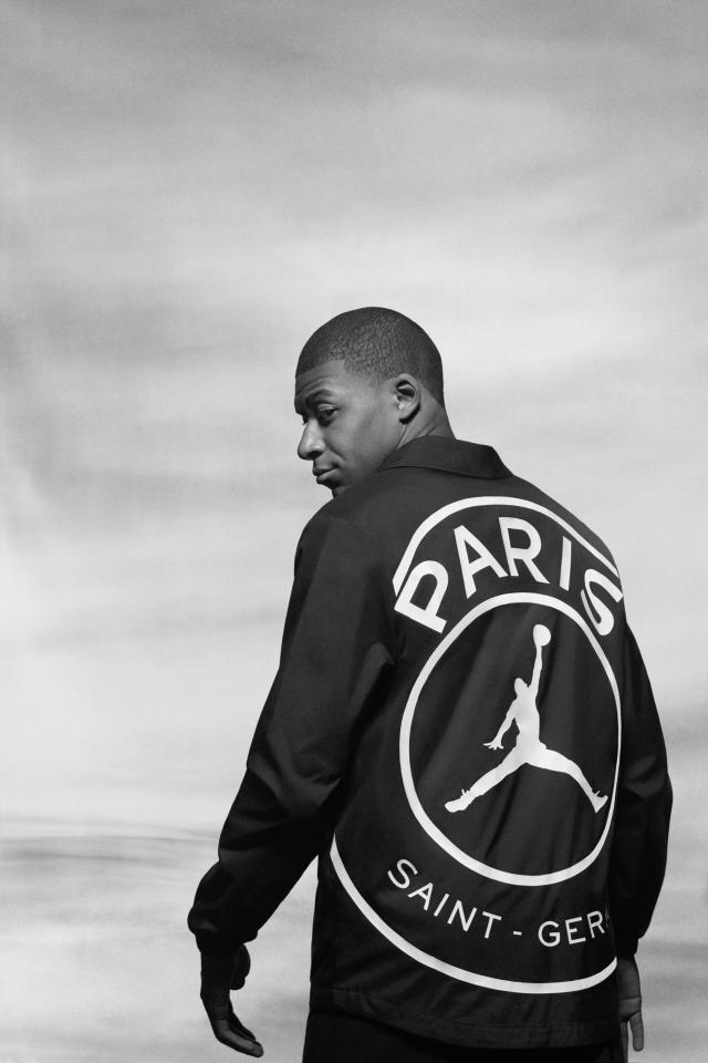 Kylian Mbappe sports a jacket with the jumpman logo made famous by Jordan