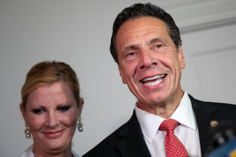  Andrew Cuomo with girlfriend Sandra Lee as he speaks to media after voting in the New York Democratic primary election