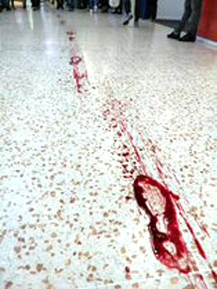  Blood trails were left on the packed shopping centre floor where young children were present