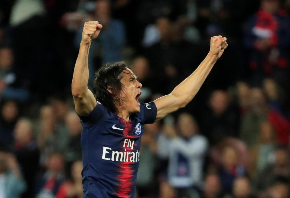 Edinson Cavani celebrates all-but clinching the three points at home