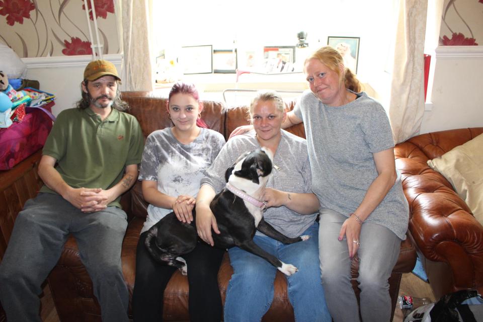 Kelly, centre right, is being supported by her family