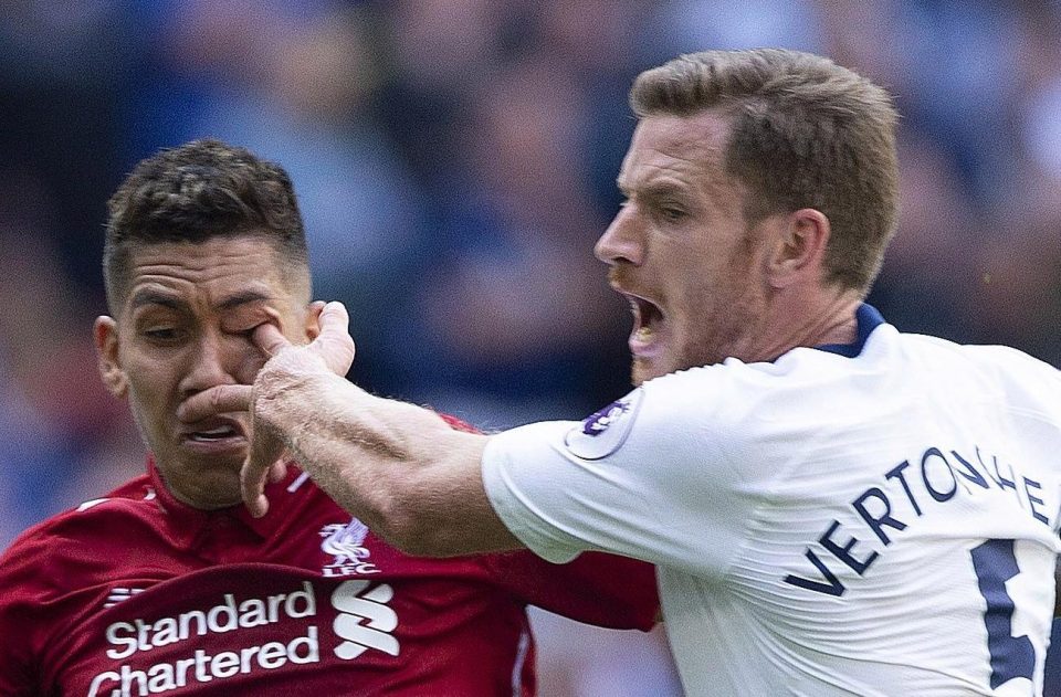  Roberto Firmino was forced off with an injured eye after a wild swipe by Jan Vertonghen