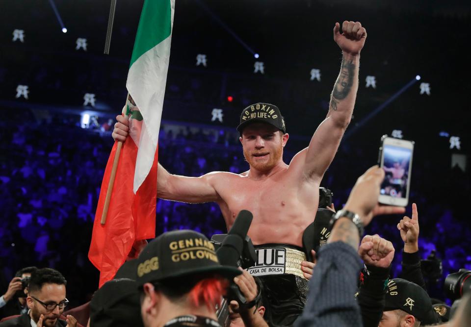  Mexican star Canelo reacts after he is named as the new WBA and WBC world champion