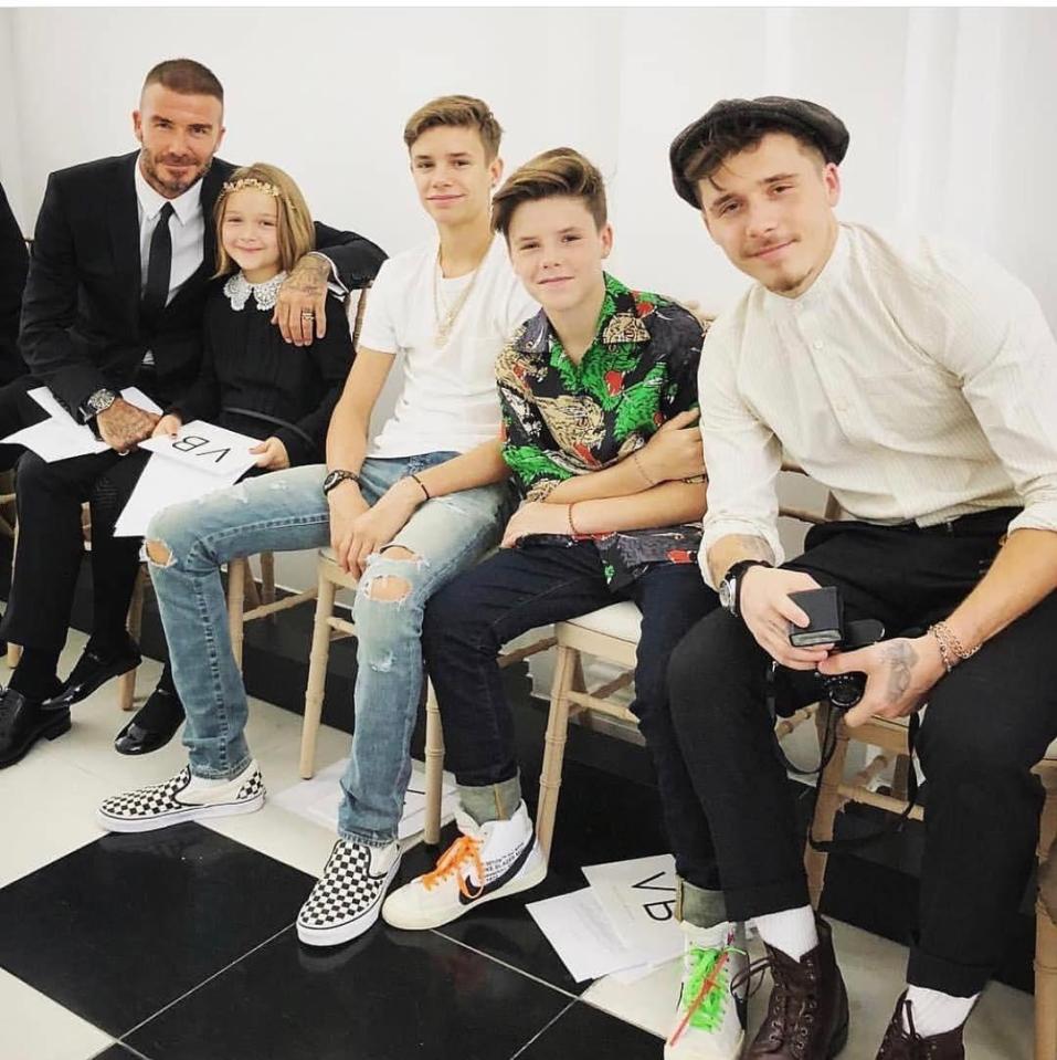  David Beckham took his children Harper, Romeo, Cruz and Brooklyn to support his wife Victoria at her first London Fashion Week show