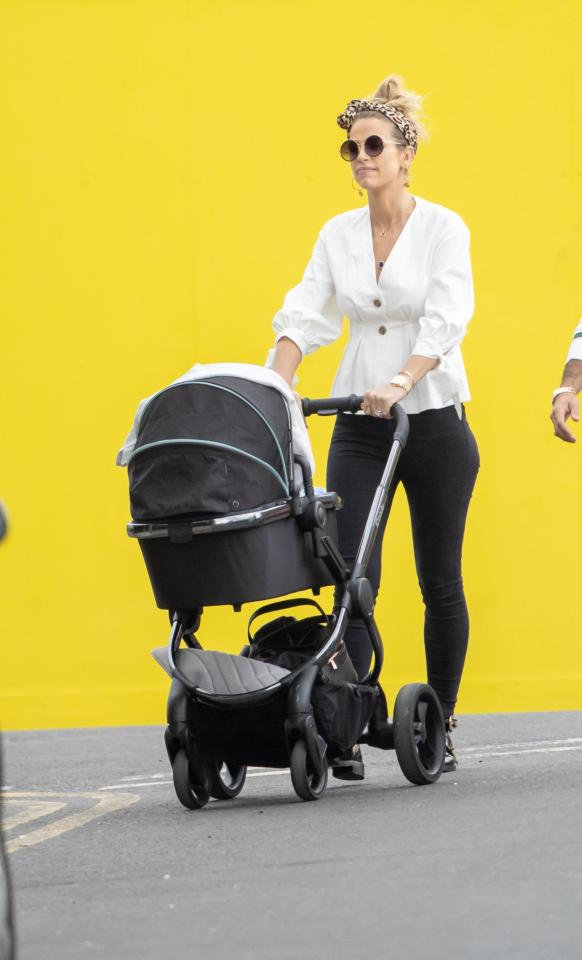  Vogue was seen pushing their little boy in his pram