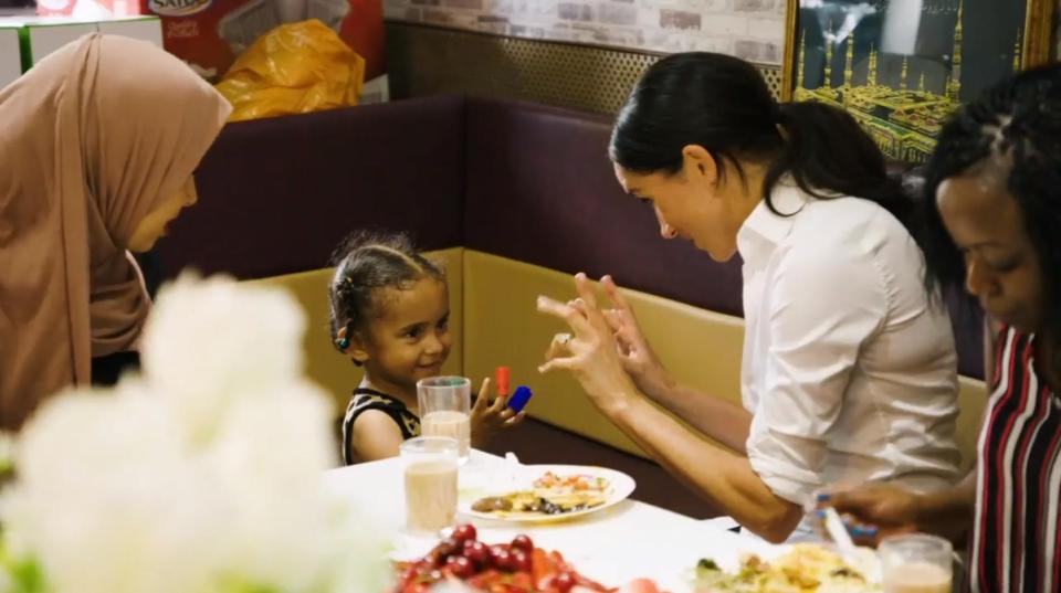  Meghan Markle made a little girl's day as she visited the Hubb Community Kitchen in London