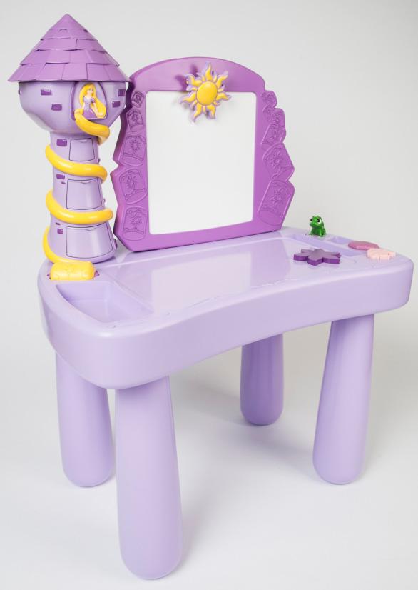  Tangled fans will love this craft desk which has a reversible chalk board