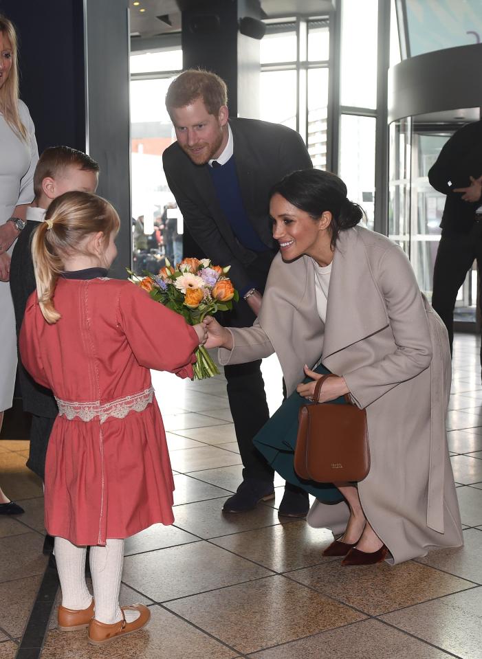  Meghan is constantly proving she is a natural with kids