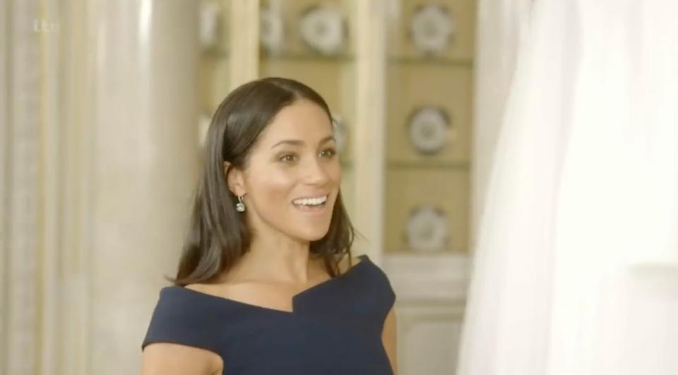  Meghan Markle is reunited with her wedding dress in a touching moment on a new documentary