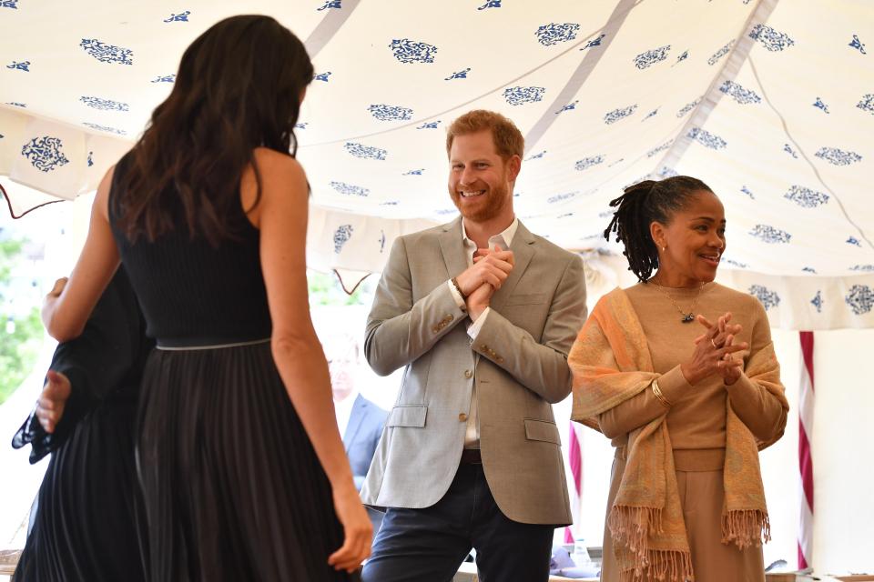  This photo of a besotted Prince Harry, standing alongside his mother-in-law Doria, has been sending Royal fans wild