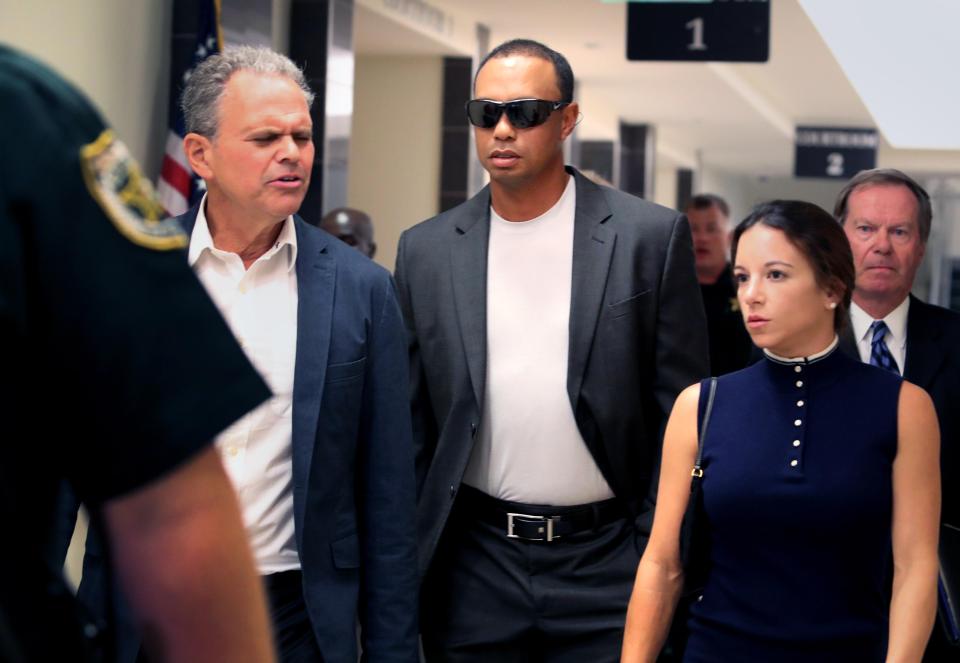  Tiger Woods and Erica leaving court in October 2017