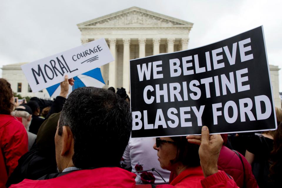  Protests pictured outside Capitol Hill demanding Republicans take note of Ford's accusation