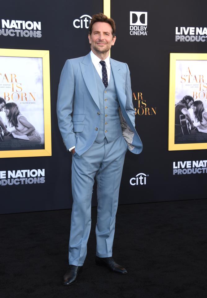  Bradley meanwhile looked typically handsome in a pale blue three-piece suit