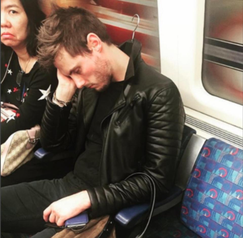  Sleepy bloke didn't even bother to take the coat hanger out of his jacket