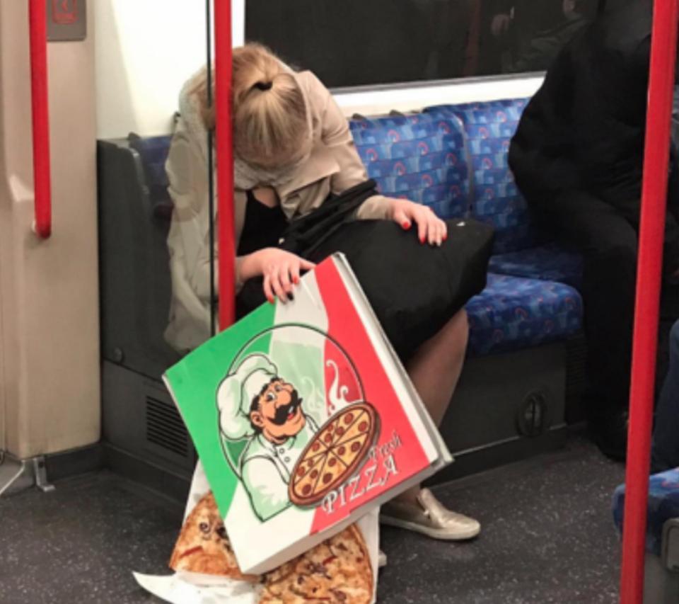  This lady's pizza might not be so 'fresh' by the time she reaches her station