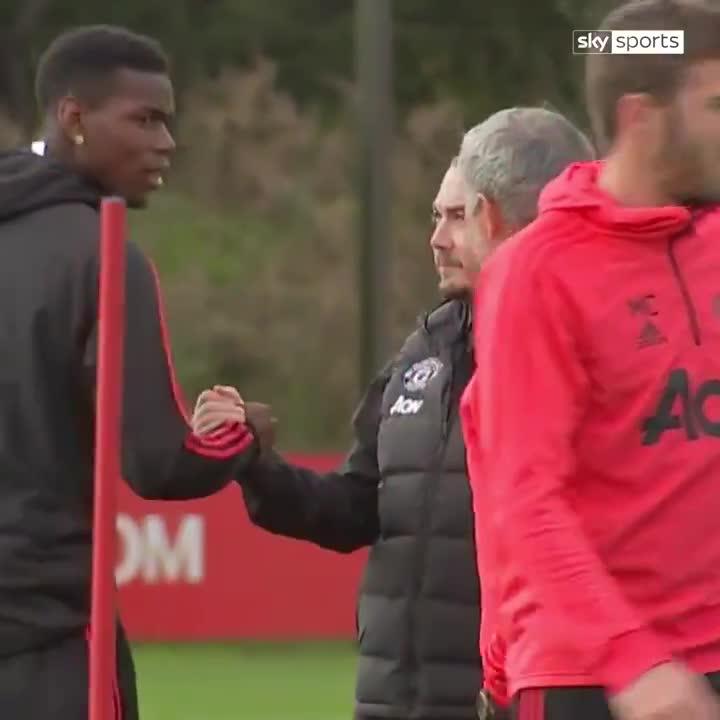  Pogba stared down at something Mourinho had muttered