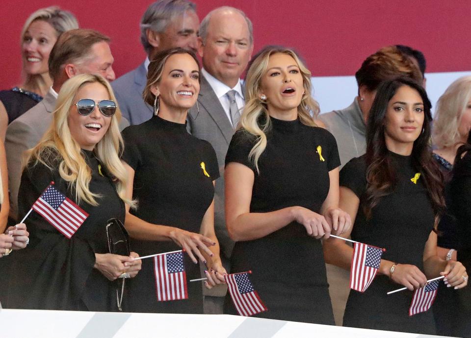  Team USA's WAGs arrived armed with small flags to show their support