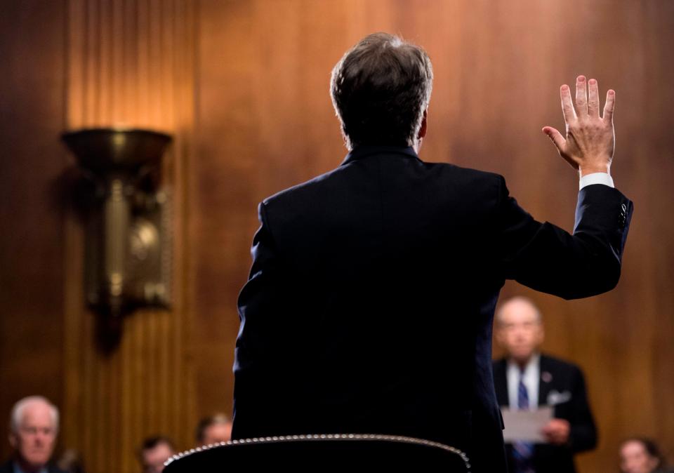 Kavanaugh is sworn in before testifying at the Senate Judiciary Committee on Capitol Hill