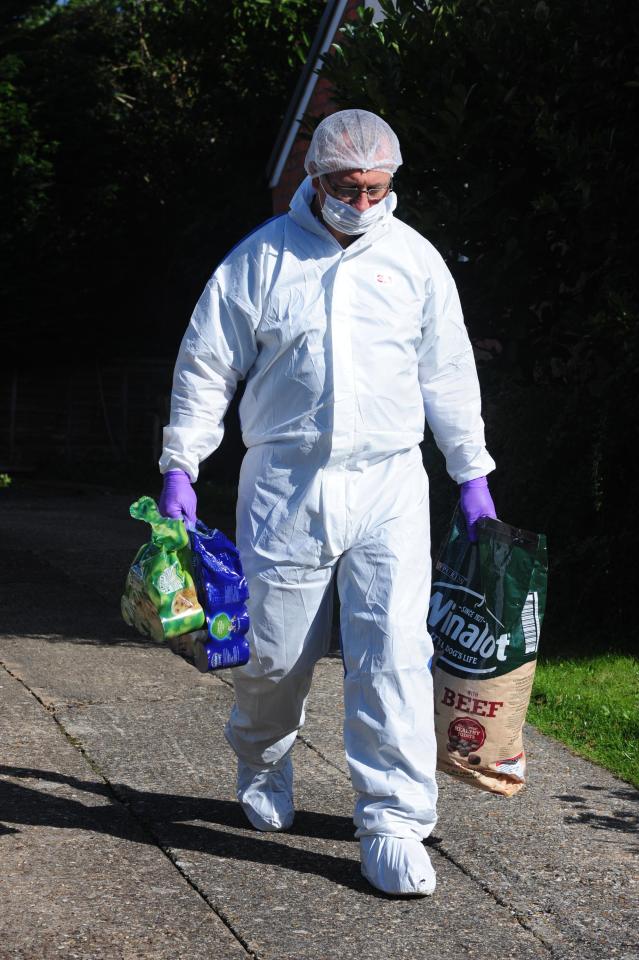  One forensics officer was seen carrying a bag of Winalot and cans of dog food into the house