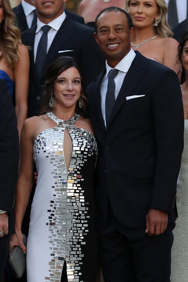  Tiger and Erica pose for a photo at the Ryder Gala dinner in Versailles last year