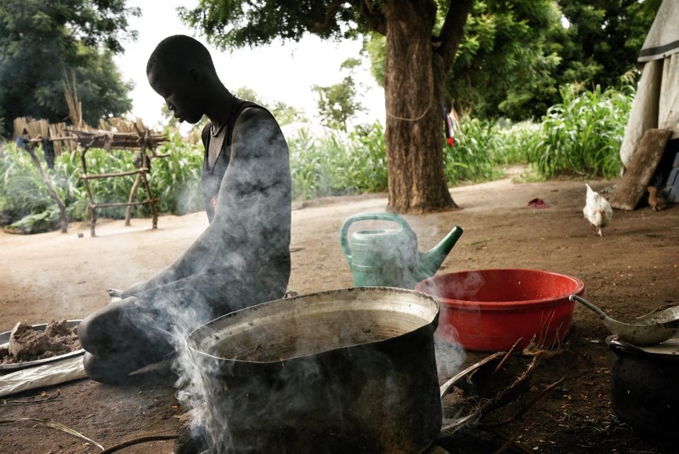  This woman fled her village and now lives with her children on a small island in a swamp