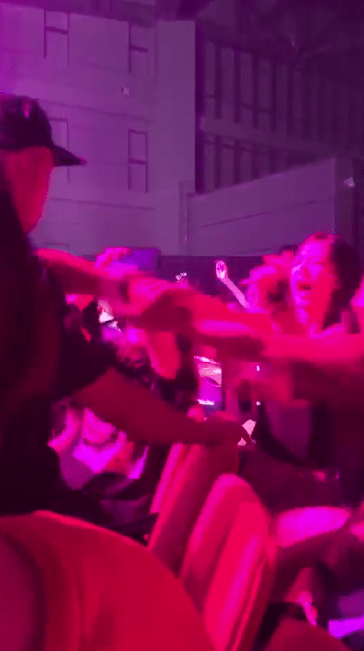  Guards approached young girls who were singing along, and shook them out of their seats