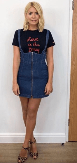 Holly wore a cute denim dress for filming