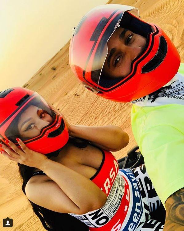  Nicki and Lewis Hamilton have fuelled dating rumours by posing together on a quad bike trip