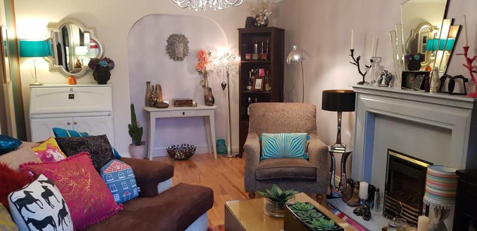  Audrey has upcycled items in her lounge including her fireplace, consul table and bureau