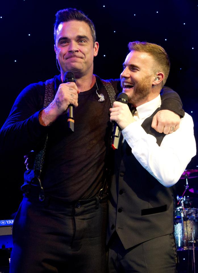  Gary Barlow with Robbie Williams... friends to foes to pals again