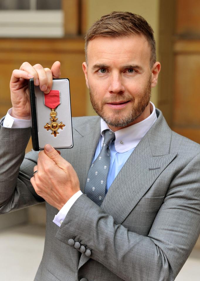  Gary was so proud to receive an OBE