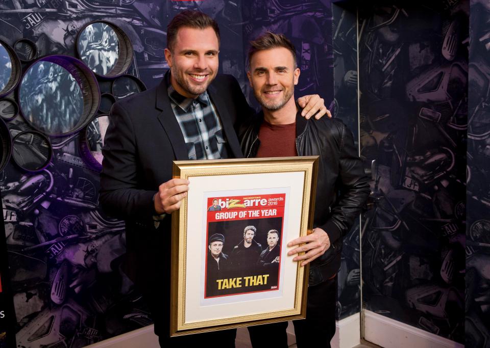  Gary Barlow receiving an award from Dan Wootton in 2016