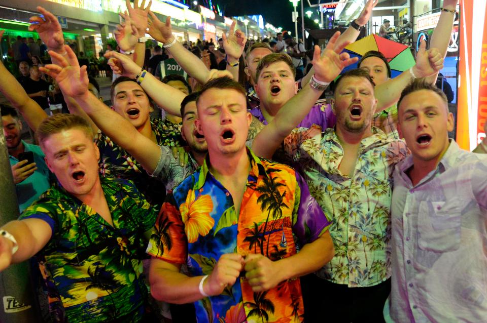  Brits visiting party destinations such as Magaluf and Benidorm could soon be free to smoke joints on the streets under plans to legalise cannabis (file picture of people partying in Magaluf)