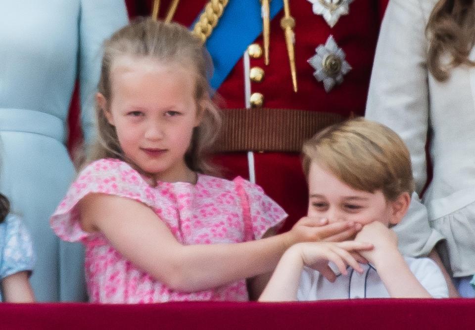  Not every seven-year-old can get away with covering the mouth of the future King of England, but Savannah Phillips sure can