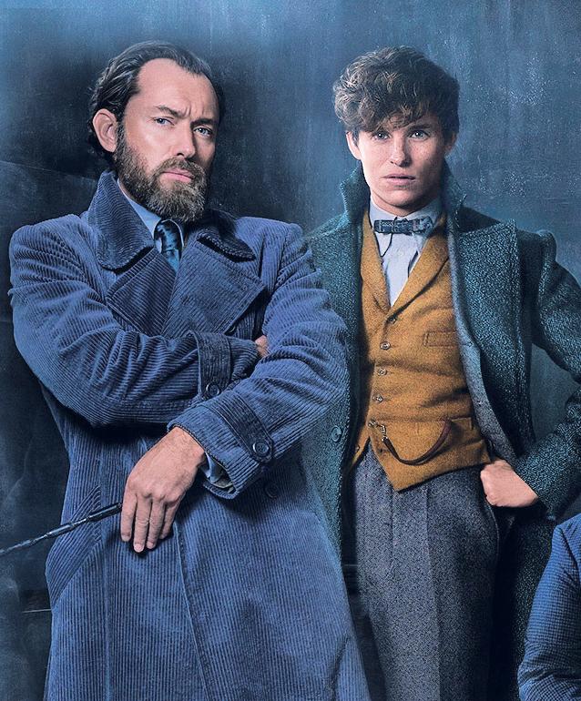 Jude Law, left, plays a yong Albs Dumbledore in the Fantastic Beasts sequel alongside Eddie Redmayne, right