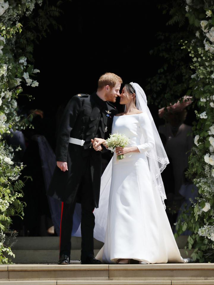  Meghan and Harry also kissed in front of the cameras after their ceremony