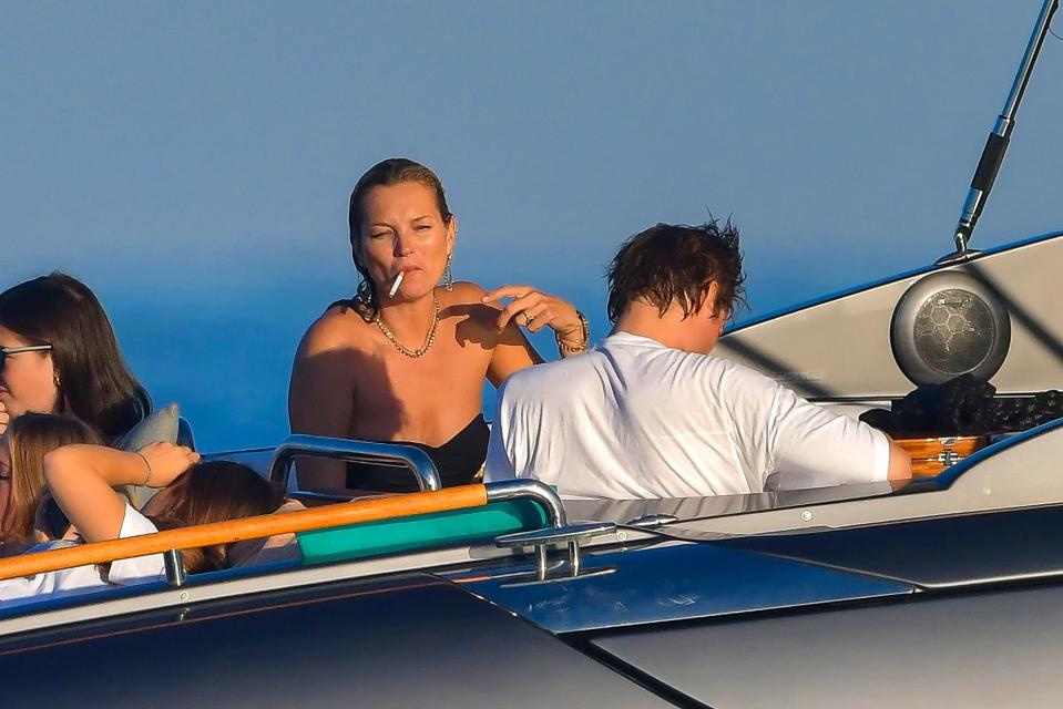  Kate enjoyed a cigarette onboard