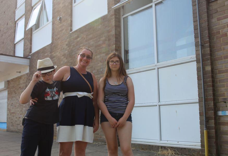  Terry with Theo, 12, and Coral, 14 outside their flat in Havant