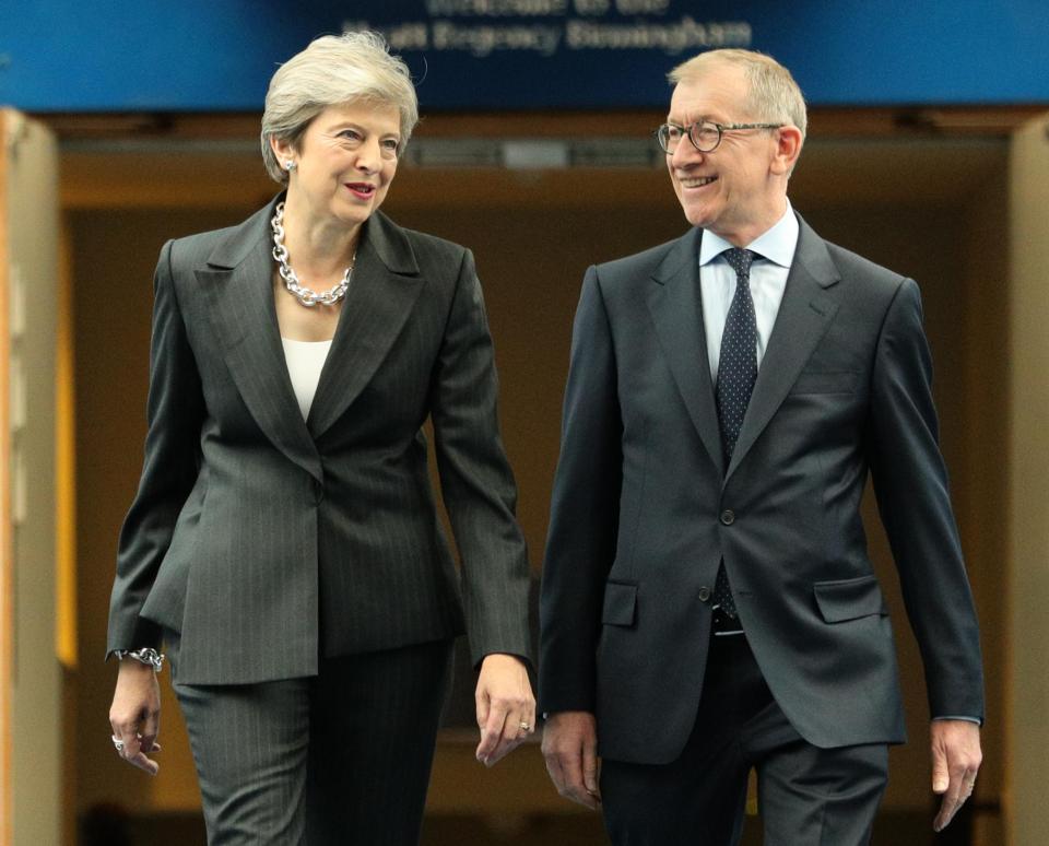  Theresa May pictured on her way to deliver her conference speech with husband Philip