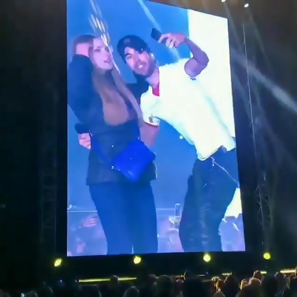  Enrique recently became a daddy to twins but was happy to oblige with the fan when she made her way on stage