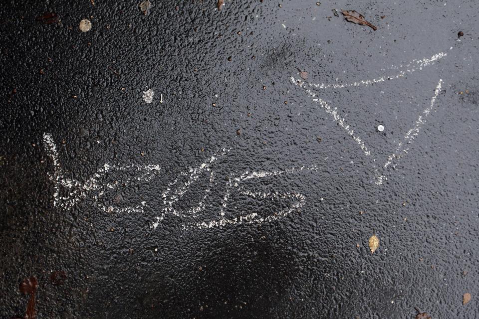  Dog owner Joanne Murphy found this bizarre scrawl outside her shop, believing it was the mark of a pet thief