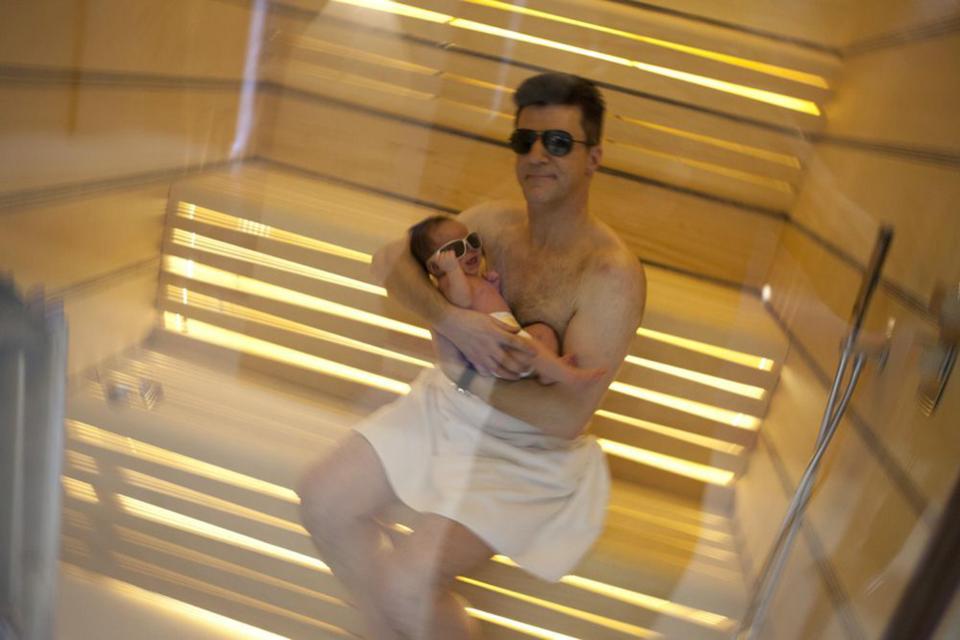  Simon Cowell's boy Eric looks as cool as a cucumber as father and son hit the sauna