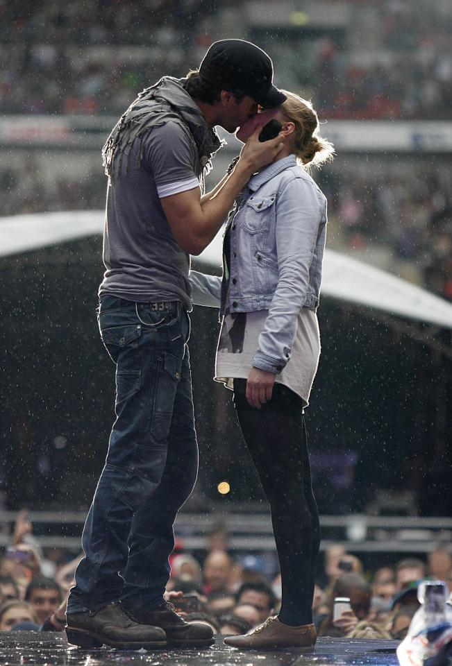  The singer also smooched with Sophie Elphick at Capital FM's Summetime Ball at Wembley