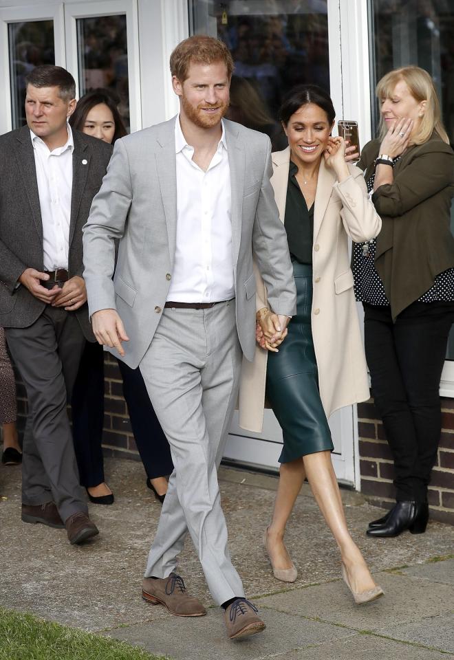  The couple weren't afraid to hold hands in front of the cameras