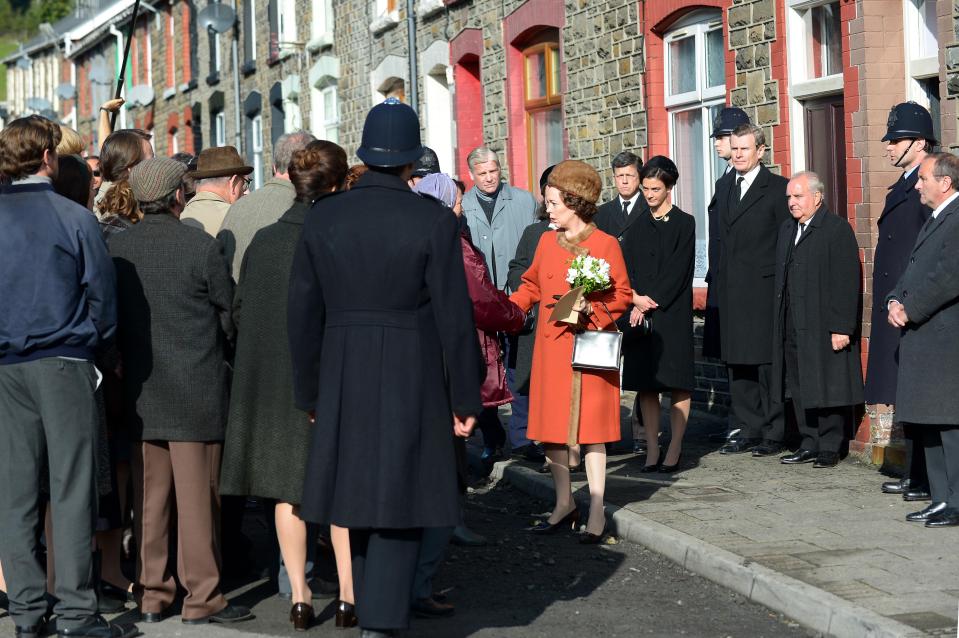  Olivia was seen mingling with mourners in character - just like the Queen did