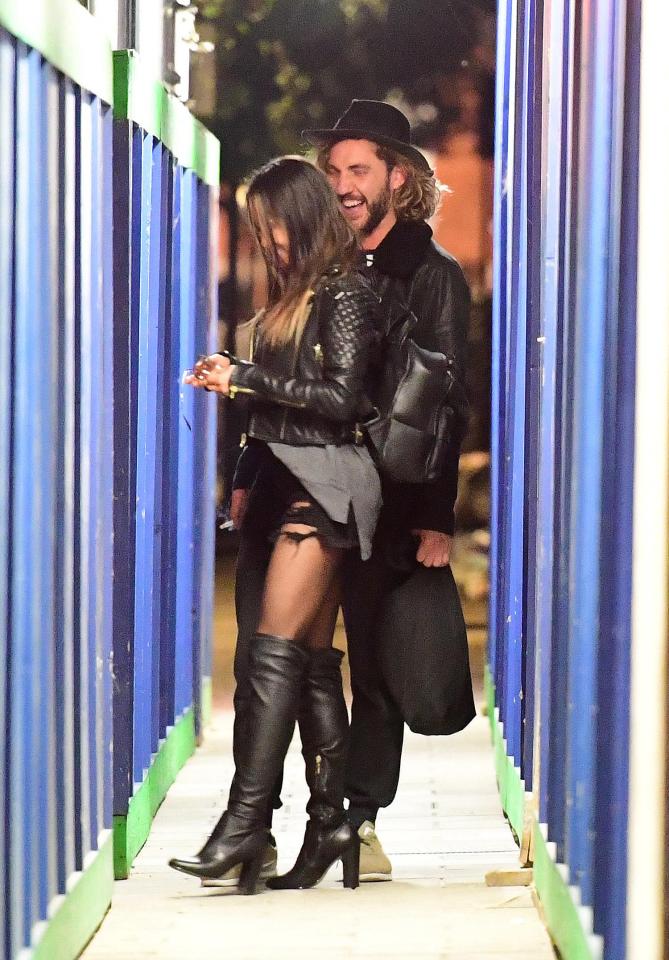  Katya wore ripped hotpants and knee-high boots for her night out with Seann