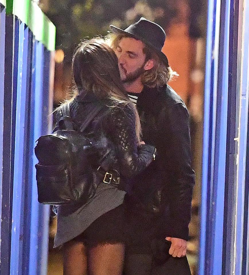  The couple - who were both in relationships at the time - were caught snogging outside a London pub