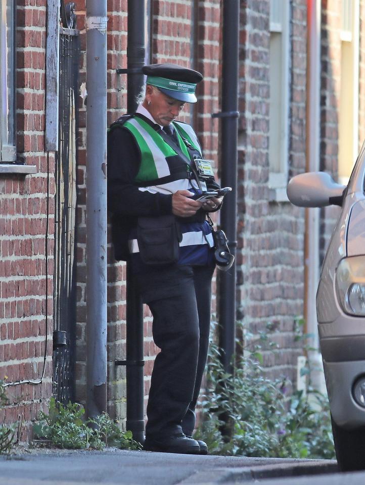  Brunt stepping behind corners while printing out tickets to avoid being seen